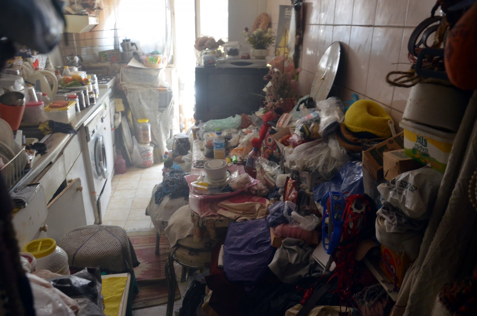 Yangın ihbarı çöp evi ortaya çıkardı