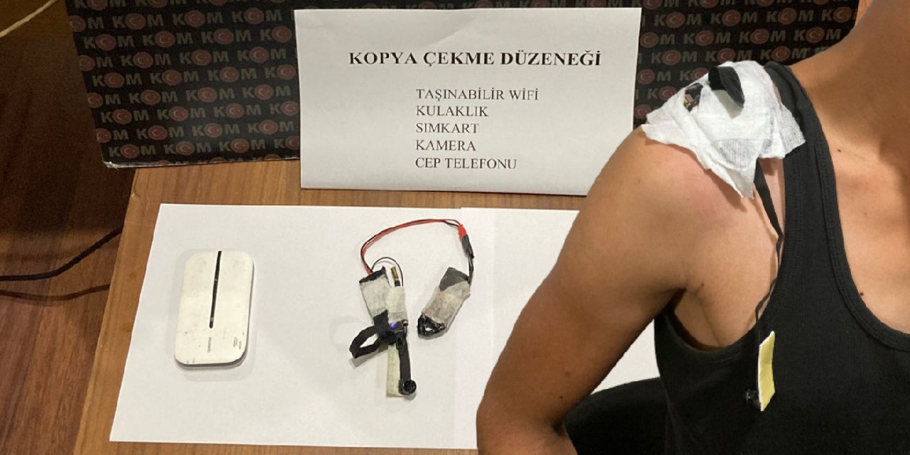 Ehliyet sınavında kopyaya suçüstü: Omzuna gizli kamera düzeneği kurdu