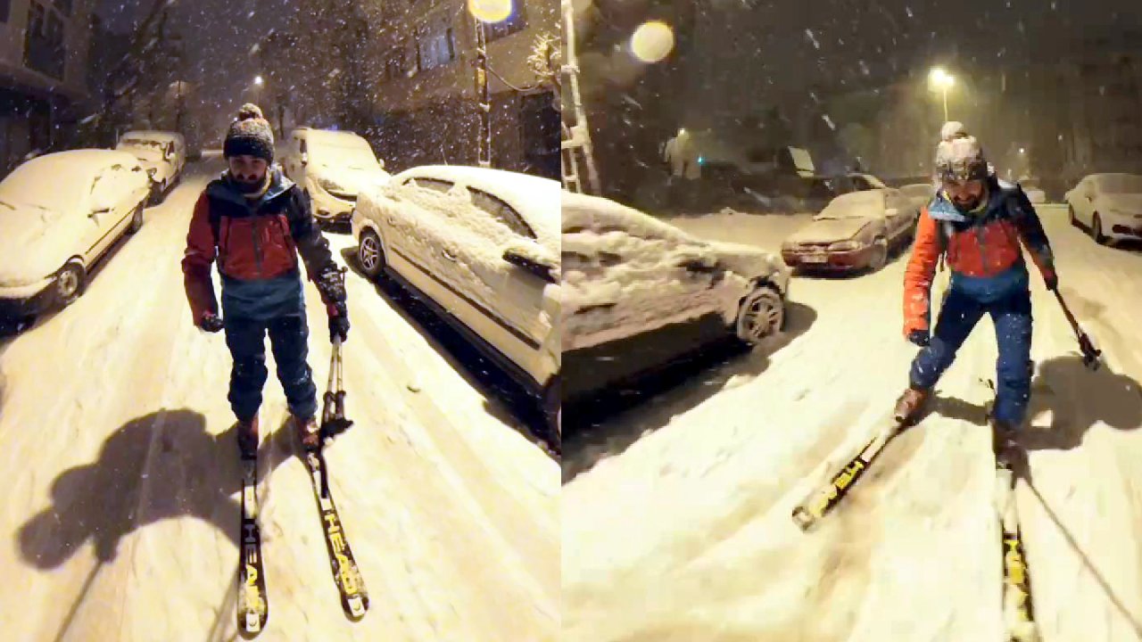 Kar yağışı sonrası sokaklarda kayak yaptı