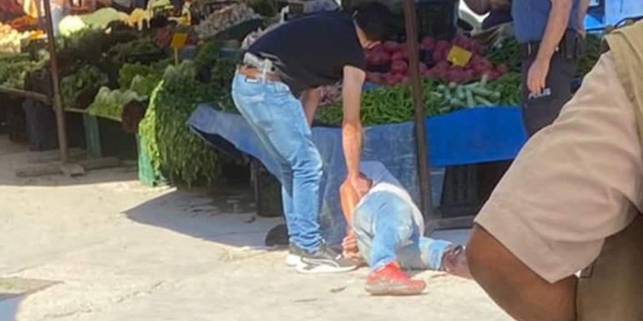 Halk pazarında bıçakla saldırdı, ayağından vurularak yakalandı