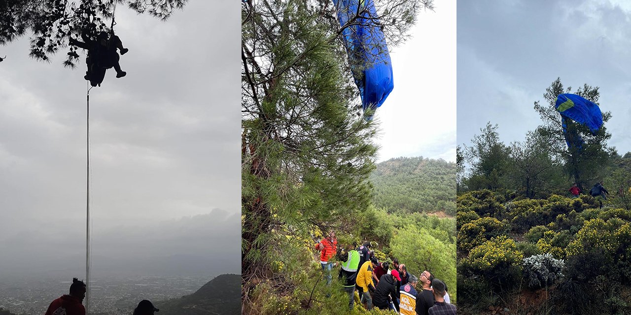 Ölüdeniz'de fırtına ve yağmur paraşütçüleri zorladı: Ağaçta asılı kaldı