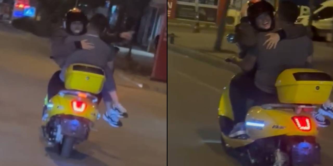 Motosiklette Kız Arkadaşını Kucağında Taşıdı