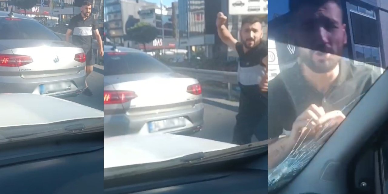 Yol kesen trafik magandası otomobilin camını kırdı