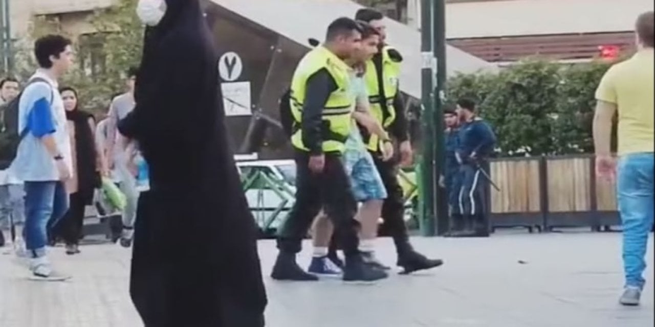 İran'da şort giyen erkek ahlak polisi tarafından gözaltına alındı