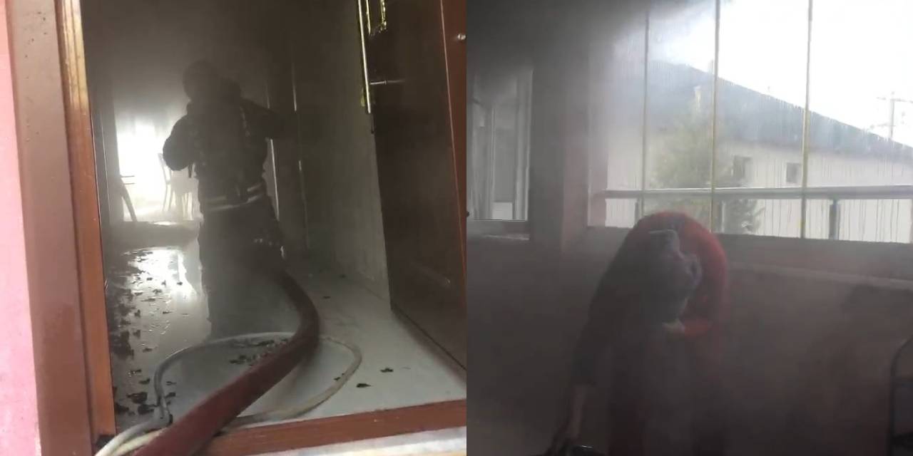 Yangında mahsur kalan 2 kişinin kurtarıldığı anlar kamerada