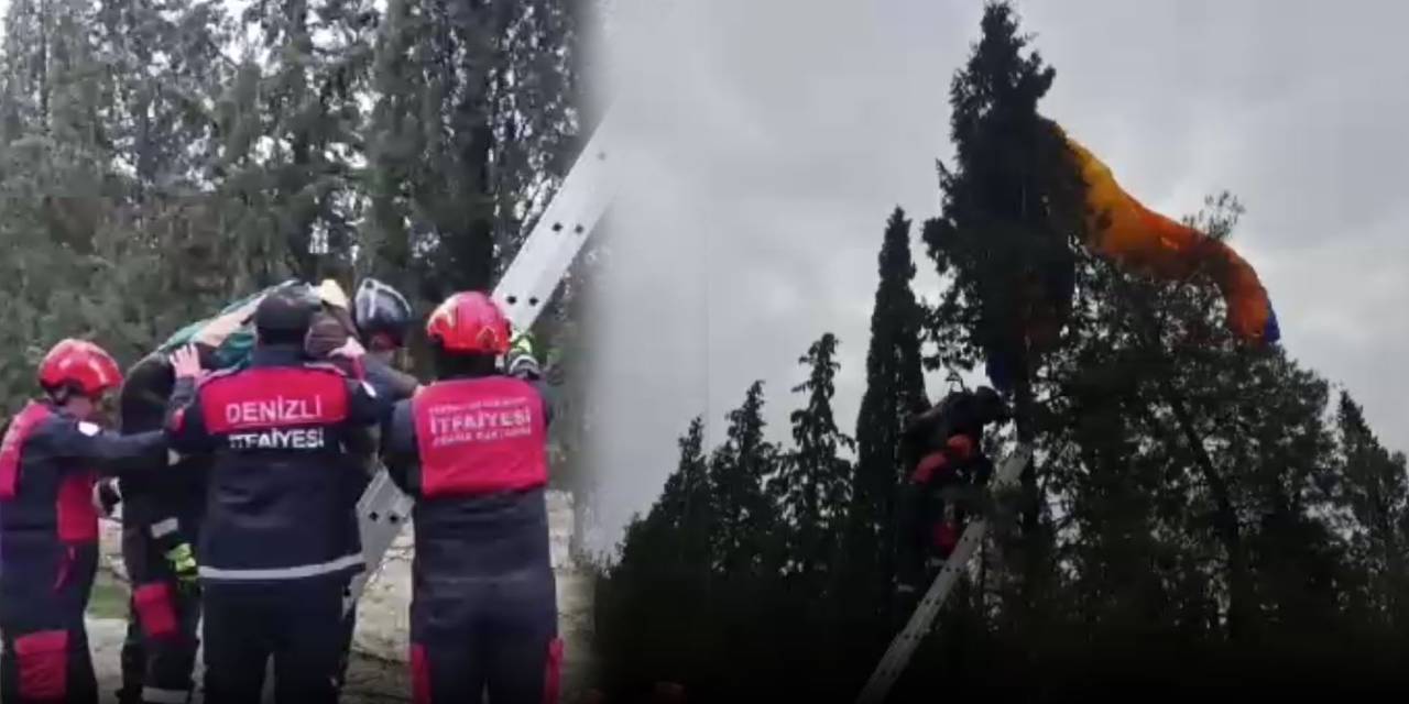 Paraşütü ağaca takılan pilot ağaçta mahsur kaldı: İtfaiye kurtardı