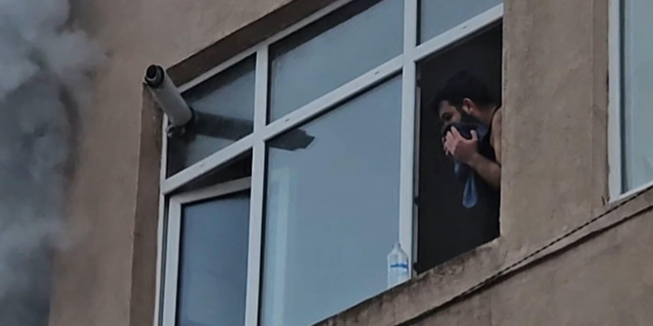 6 katlı binadaki yangında mahsur kaldı