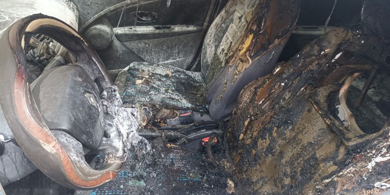 Ölümle tehdit edip otomobilini ateşe verdi