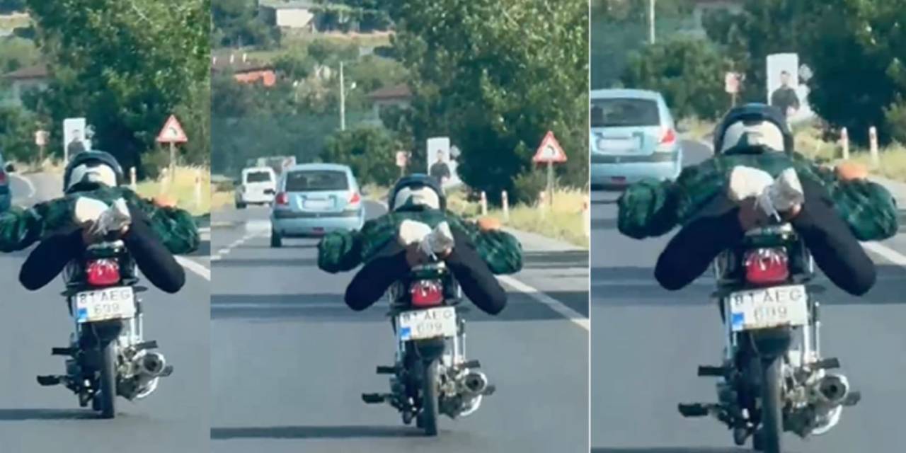 Trafiği böyle tehlikeye attı! Yatarak motosiklet sürdü