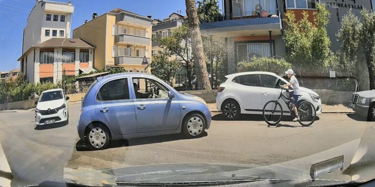 Kazada savrulan otomobil bisikletli çocuğa çarptı