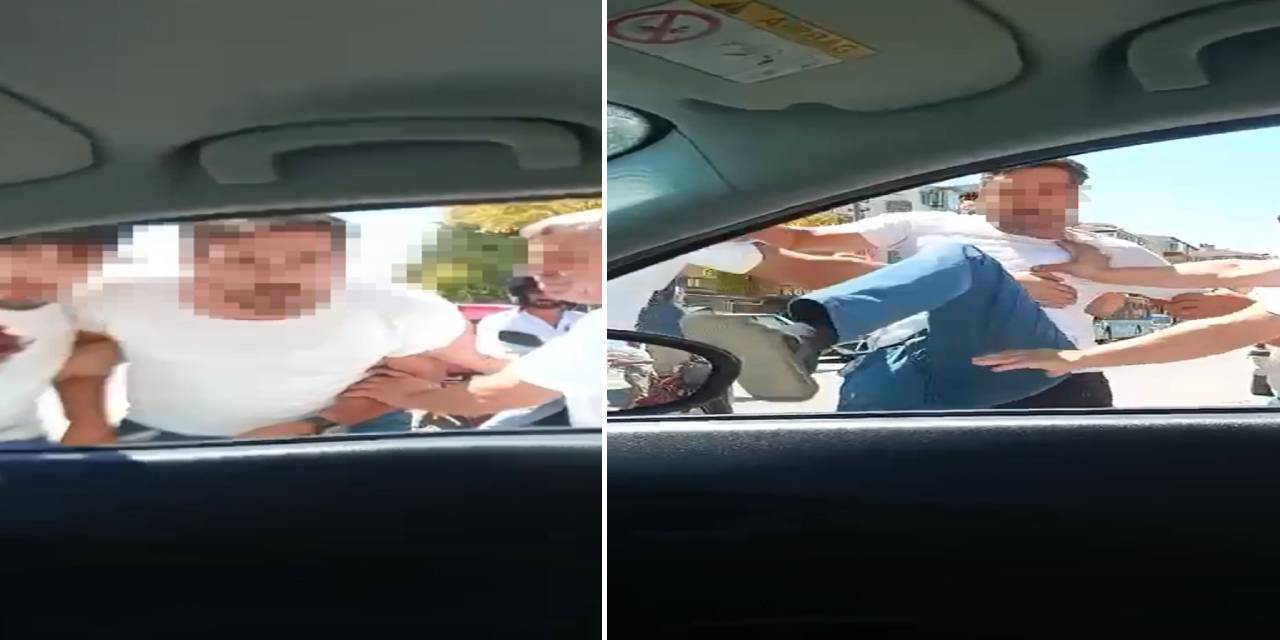 Tartıştığı sürücünün aracını böyle tekmeledi!