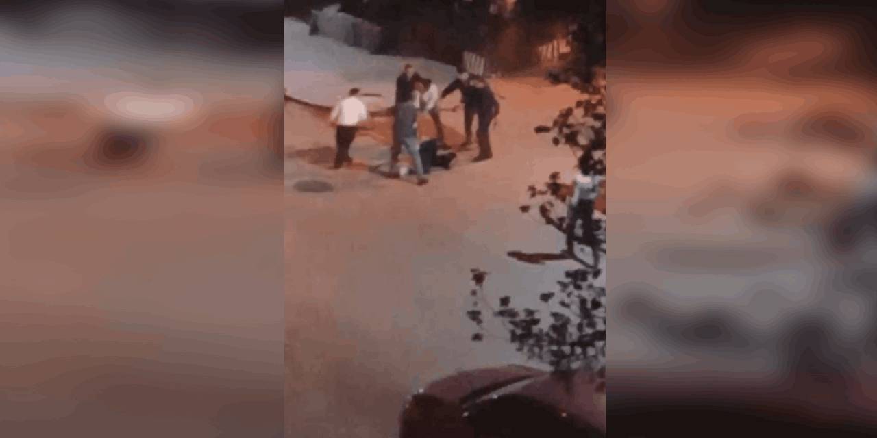 Sokak ortasında kovaladıkları kişiyi sopalarla dövdüler