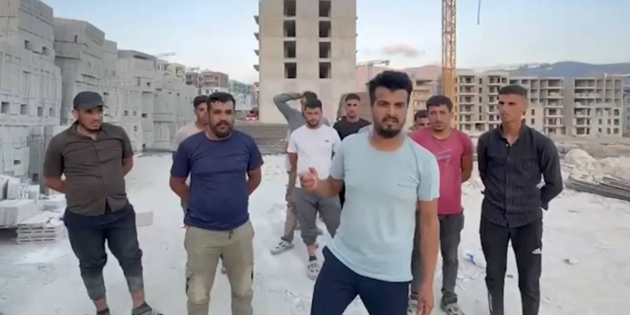 Hatay'da maaşını alamayan TOKİ işçileri çatıya çıktı: Her şantiyede ücret gaspı yaşanıyor