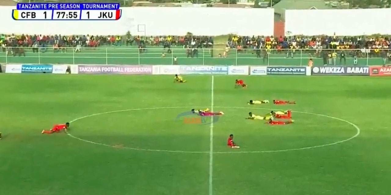 Futbolcular bir anda yere yatıp hayatta kalma taktiği uyguladılar