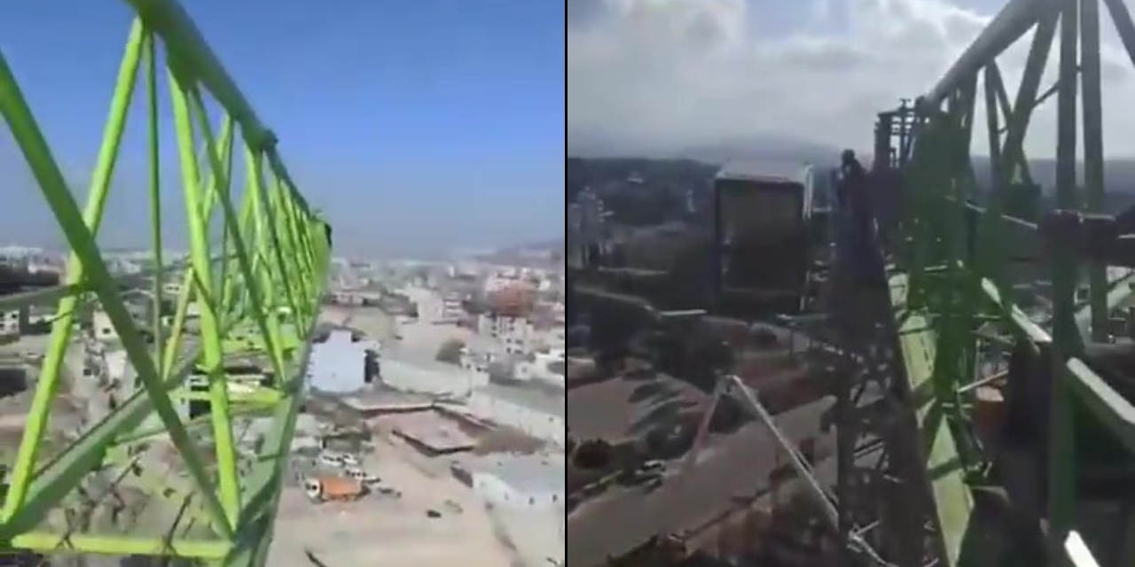 Hatay'da maaşlarını alamayan işçiler vince çıktı! Yüzlerce metre yüksekten isyan ettiler