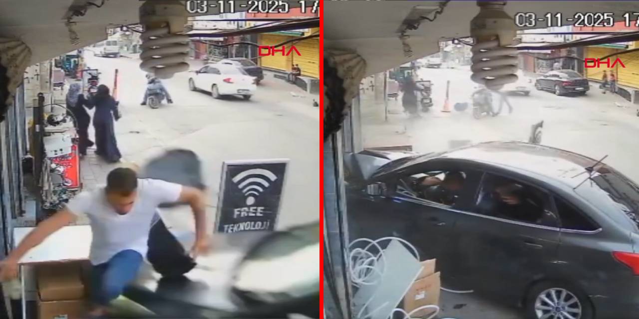 Otomobil iş yerine daldı! Kaldırımdaki yaya ezilmekten kıl payı kurtuldu