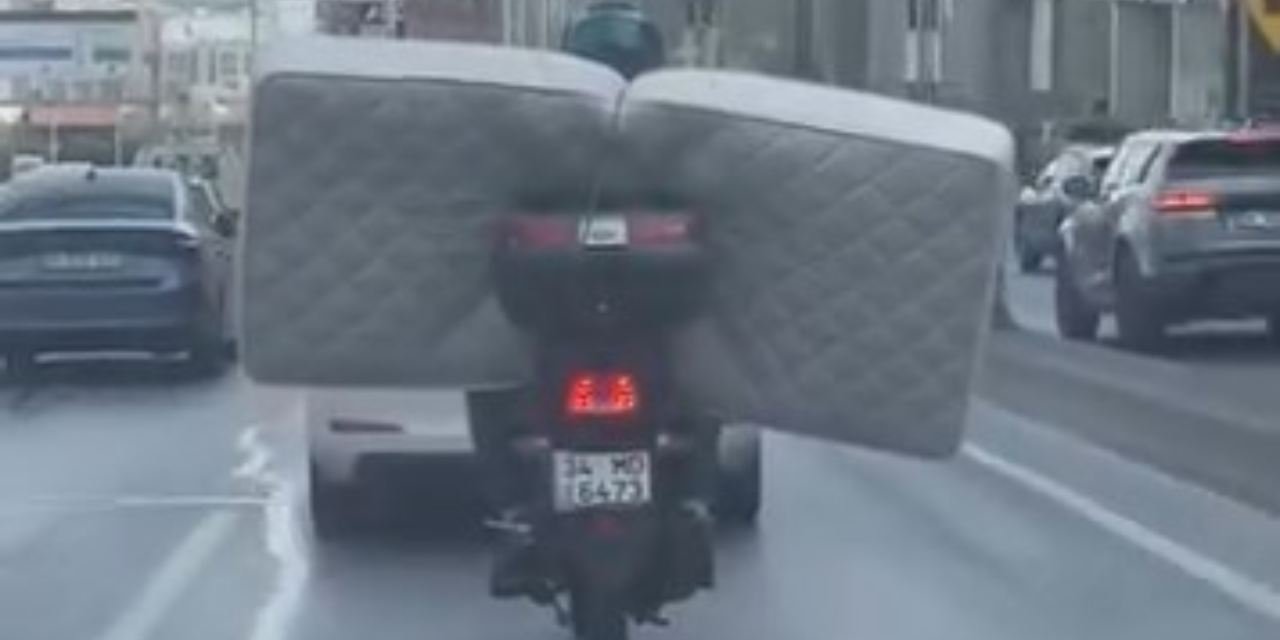 Akılalmaz görüntü: Motosikleti kamyonete çevirdi