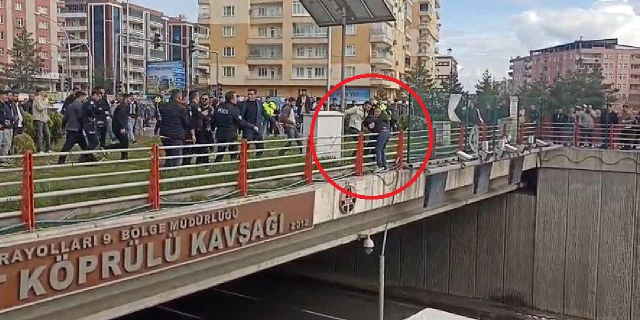 Üst geçitten atlamaya çalıştı: Polis son anda kurtardı