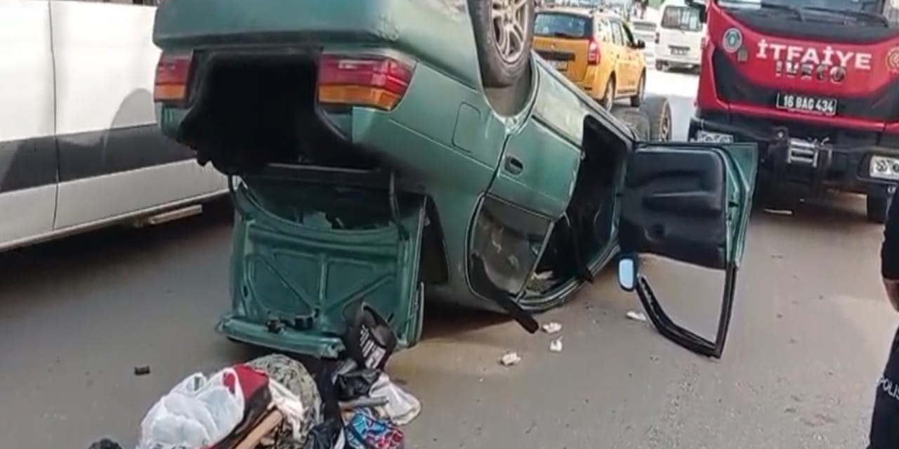 Bursa'da otomobil takla attı: Sürücü araçta sıkıştı!