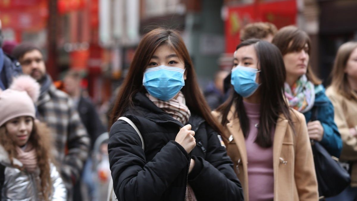 "Çinliler en az bir yıl daha maske takmalı"