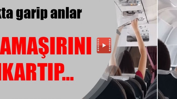 Uçakta garip anlar: İç çamaşırını çıkartıp...