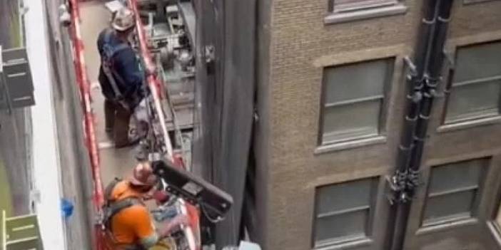 Metrelerce yüksekte çalışan işçilere pizza teslimatı böyle yapıldı