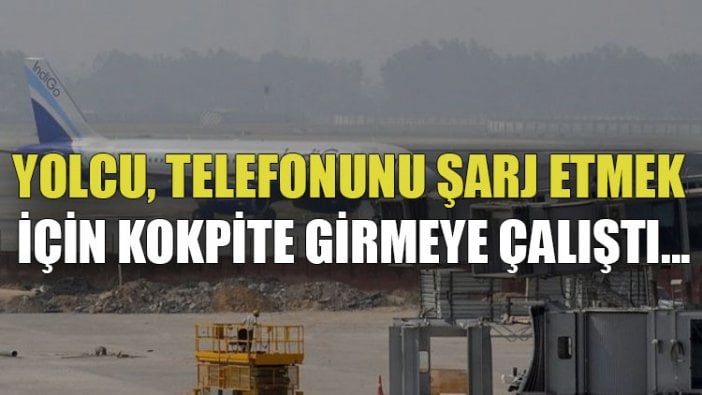 Yolcu, telefonunu şarj etmek için kokpite girmeye çalıştı...