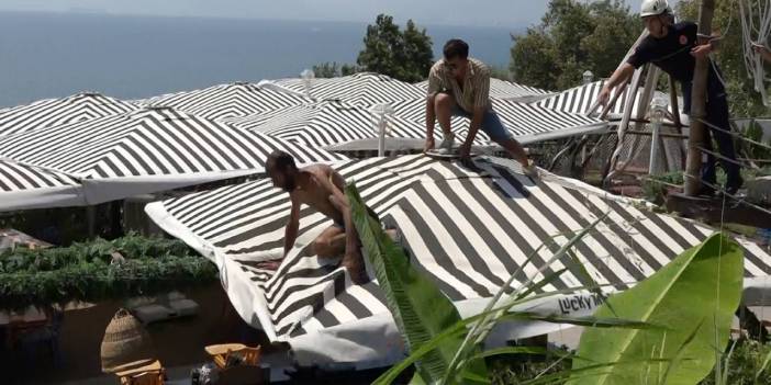 Çırılçıplak soyundu, polise zor anlar yaşattı! Üstüne çıktığı şemsiye tentesi yırtılınca yakalandı