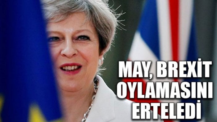 Theresa May Brexit oylamasını erteledi