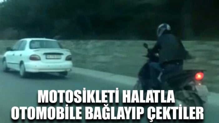 Motosikleti halatla otomobile bağlayıp çektiler