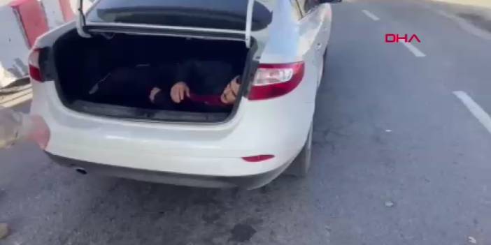 Otomobilin bagajına saklanmış kaçak göçmen yakalandı