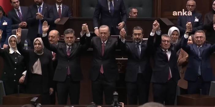 Erdoğan Nedim Yamalı'ya rozeti taktı