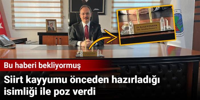 Siirt kayyumu önceden hazırladığı isimliği ile poz verdi