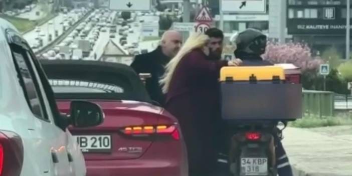 Tartıştığı motokuryeye trafiğin ortasında silah çekti: Kameraya yansıdı