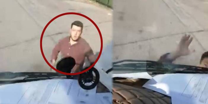 Şehir magandası kamyonetin camını yumrukladı!
