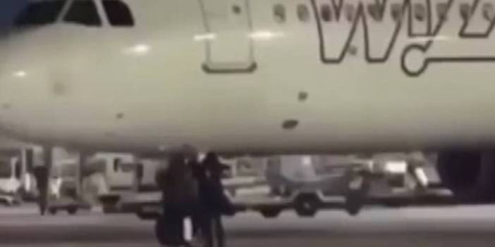 Uçağı kaçıran iki yolcu piste girdi: El sallayarak uçağı durdurdu