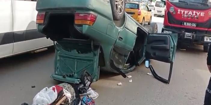 Bursa'da otomobil takla attı: Sürücü araçta sıkıştı!