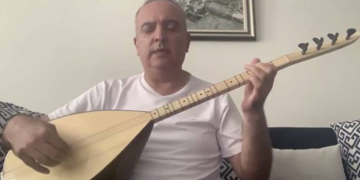 Karantinadaki başkan bağlama çalıp türkü söyledi