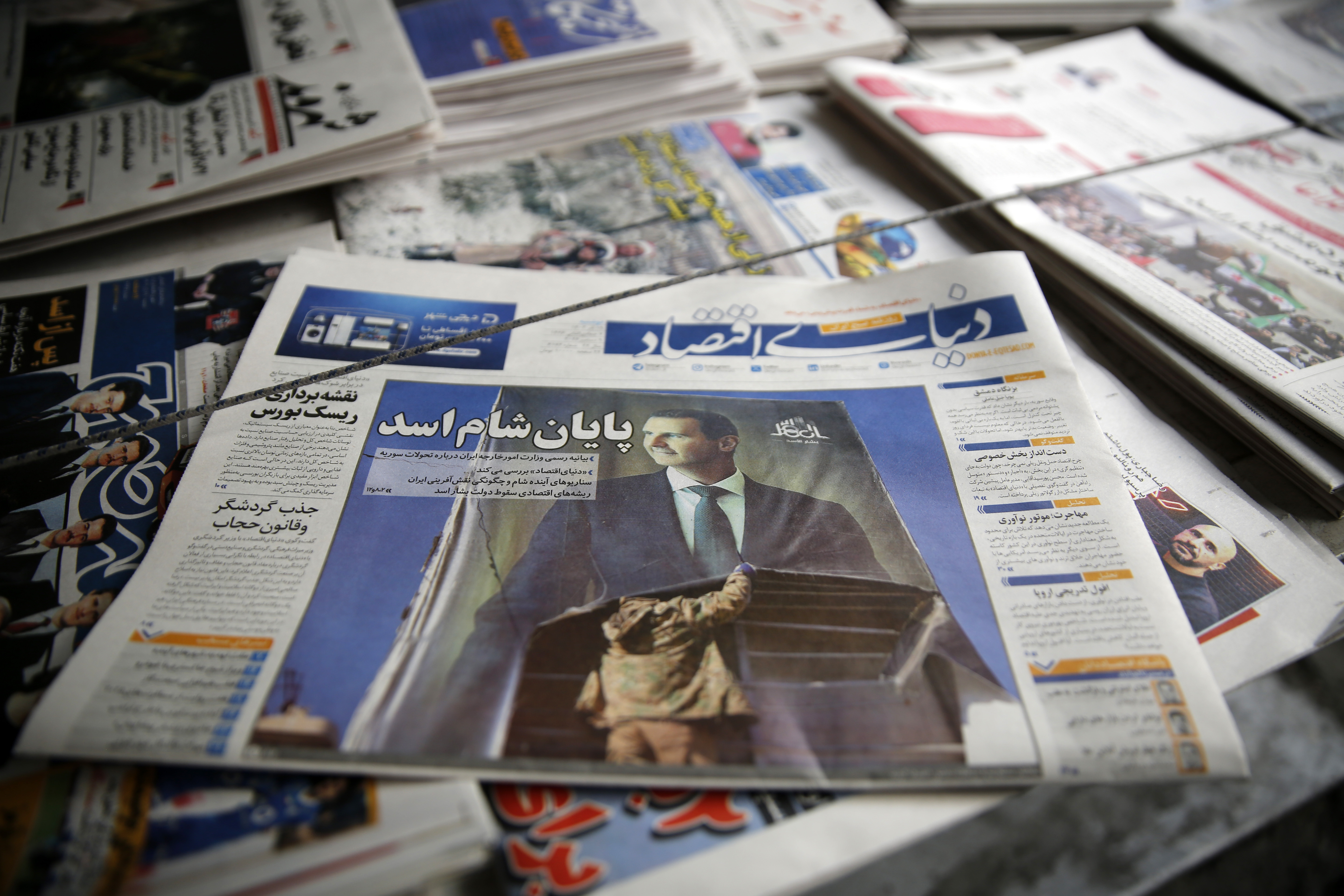 aa-20241209-36433705-36433694-irandaki-gazeteler-suriyede-61-yillik-baas-rejiminin-cokusunu-mansetlerine-tasidi-001.jpg