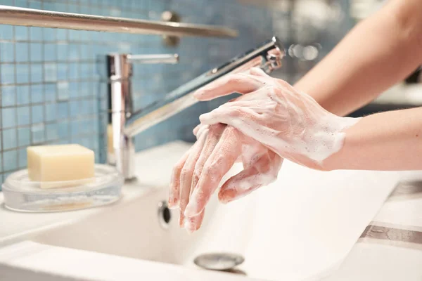 depositphotos-358565576-stock-photo-washing-hands-rubbing-soap-woman.jpg